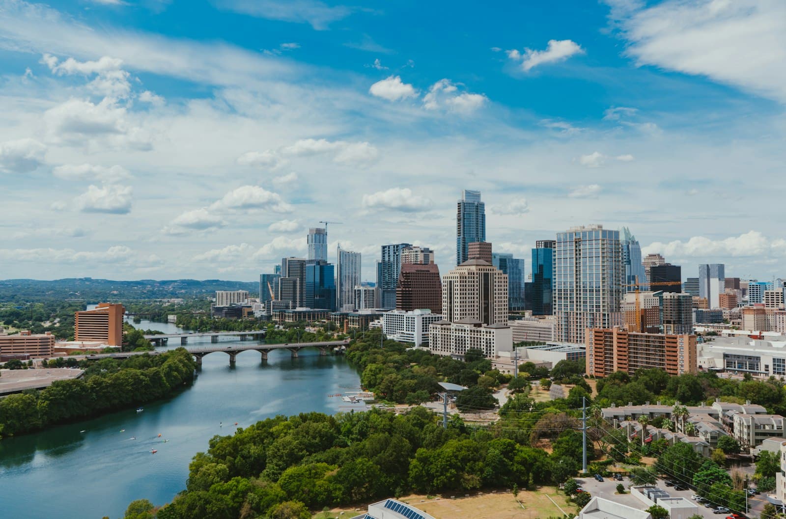 Downtown Austin skyline above Lady Bird Lake and the Congress Avenue bridge